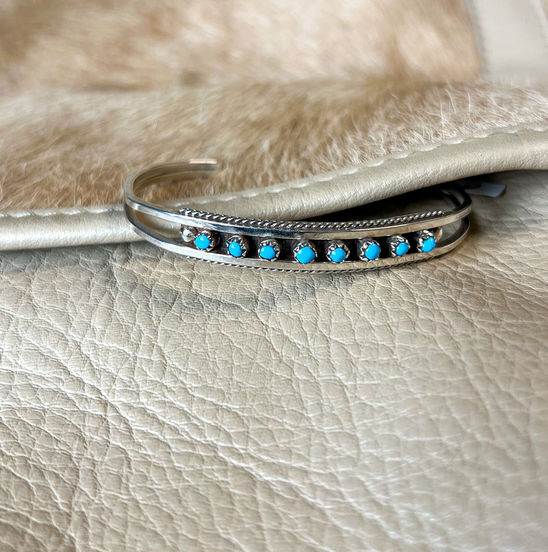 Silver bracelet with 8 turquoise stones