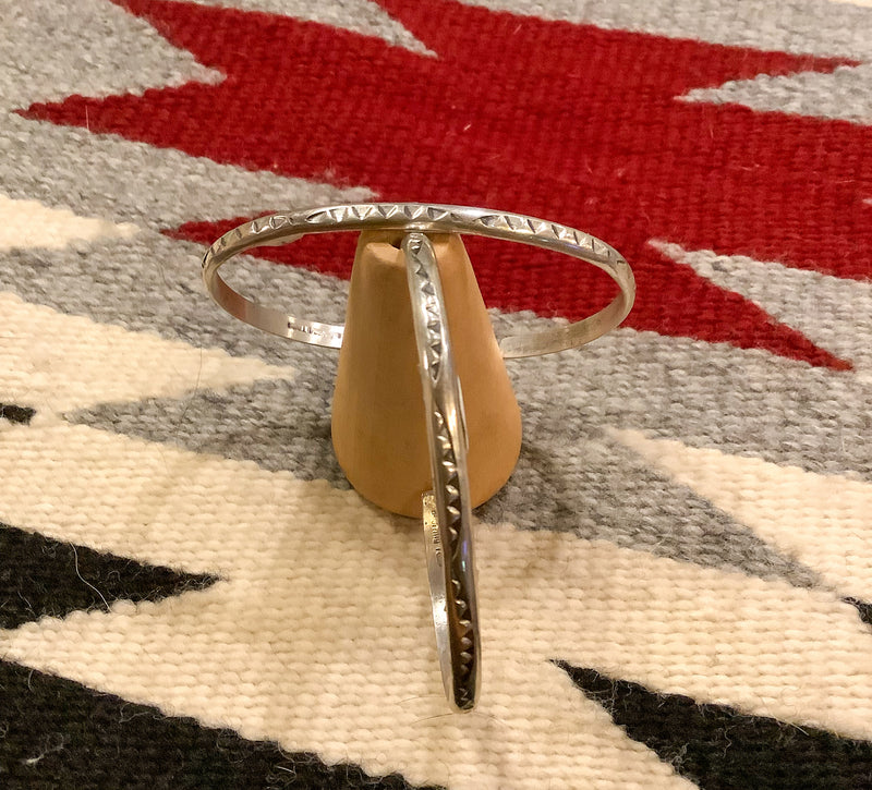 Silver bracelet with triangle horizon stamp