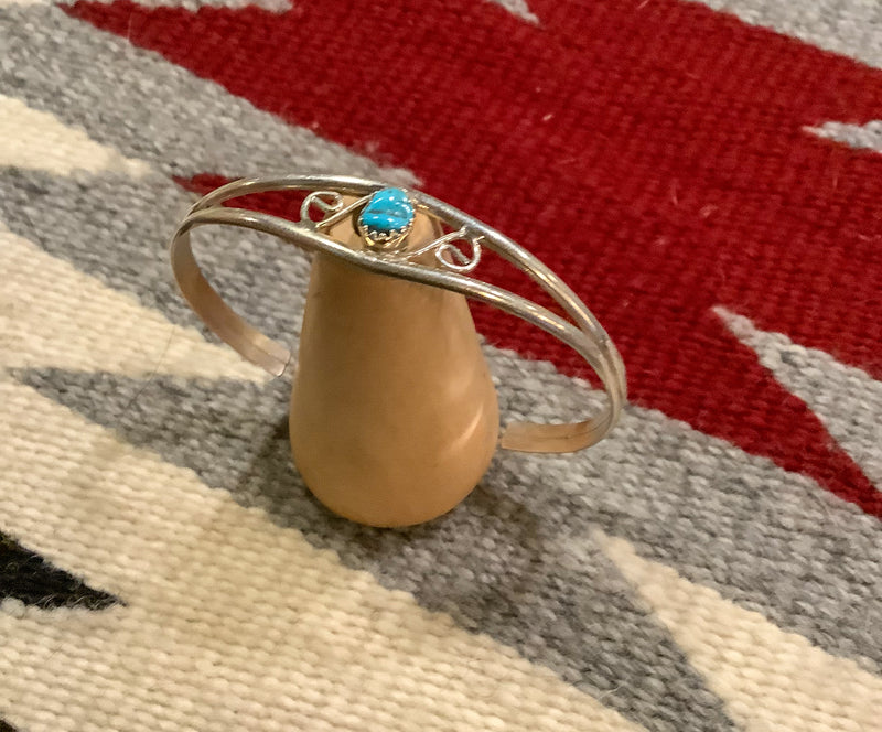 Silver bracelet with single turquoise