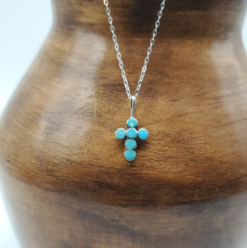 Small Turquoise with six round stones. Silver chain included