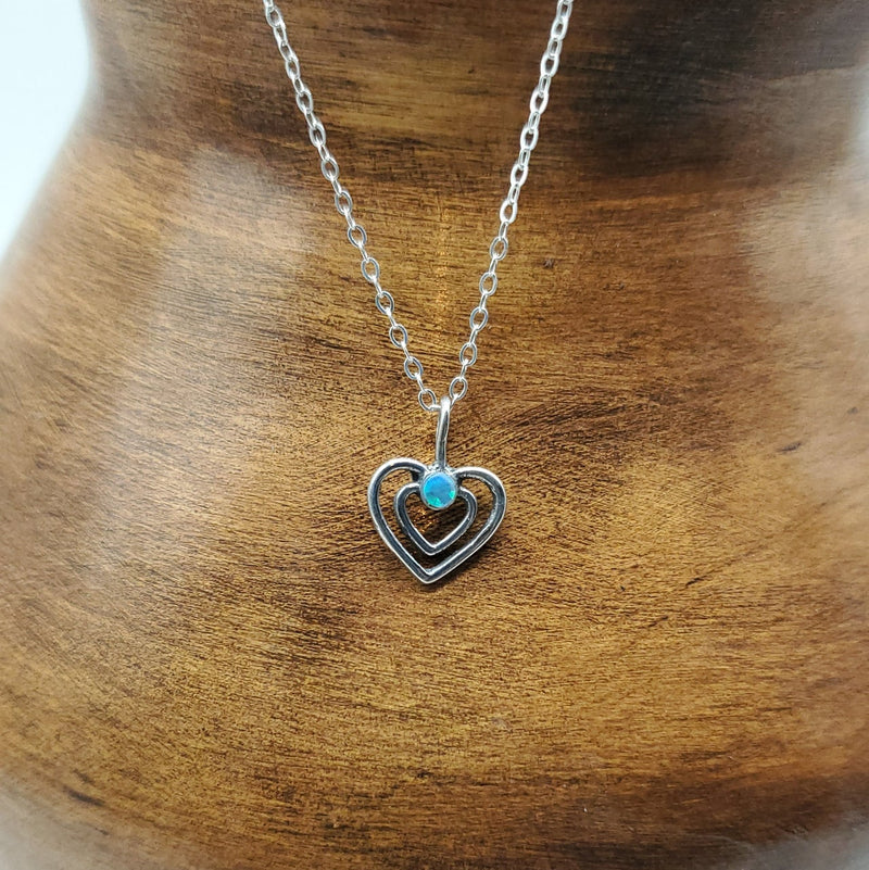 Tiny Double Heart with Blue Opal Stone. Chain included