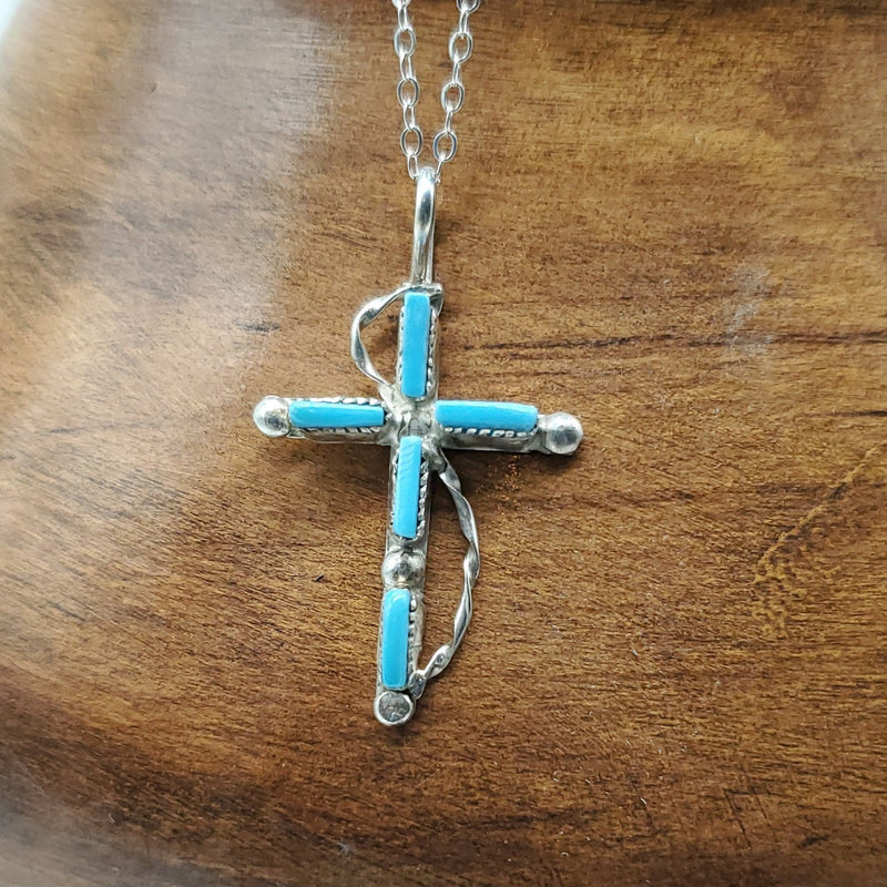 Turquoise Cross with silver S from top to bottom