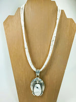 White Buffalo Pendant with Leaf Design